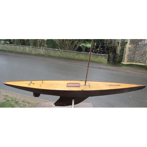 367 - Large scratch built wooden pond yacht on a stand, with single mast, opening deck hatch, simulated pl... 