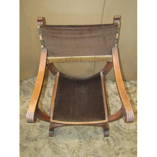 2309 - A X framed open armchair with simple upholstered pad seat and back