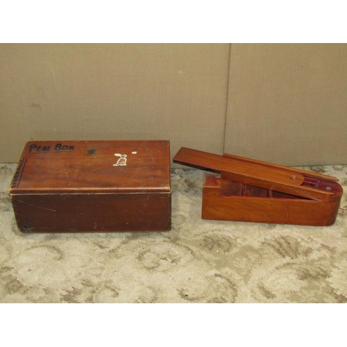 2322 - A simple vintage stained wooden child's desk containing wooden pencil/pen boxes