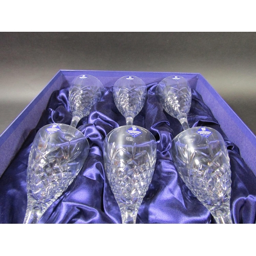 1149 - A boxed set of six large Edinburgh Crystal cut glass wine glasses.