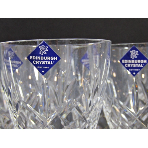 1149 - A boxed set of six large Edinburgh Crystal cut glass wine glasses.