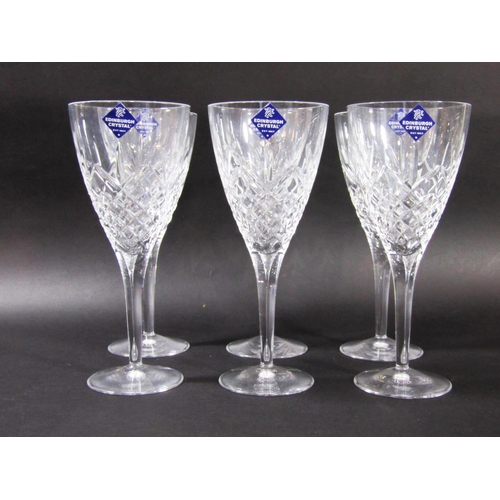 1149 - A boxed set of six large Edinburgh Crystal cut glass wine glasses.