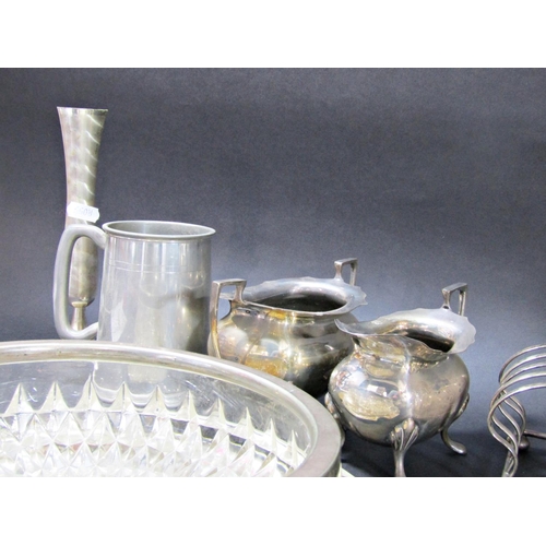 1188 - A mixed selection of silver plated items including a three piece tea service, vinaigrette stand, dri... 