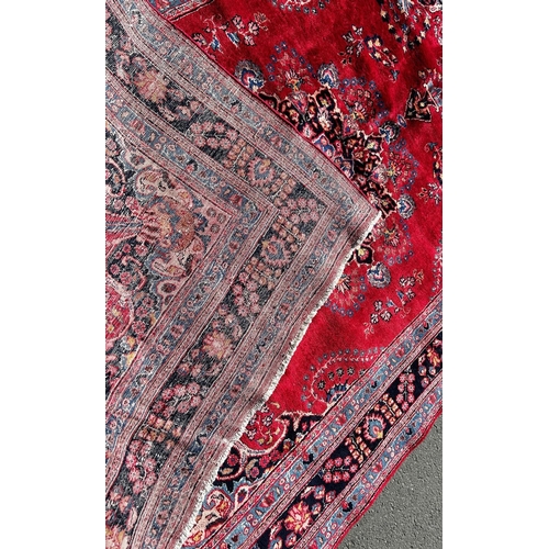 1616 - A North East Persian Meshed Carpet in good condition, with a central floral medallion on a predomina... 