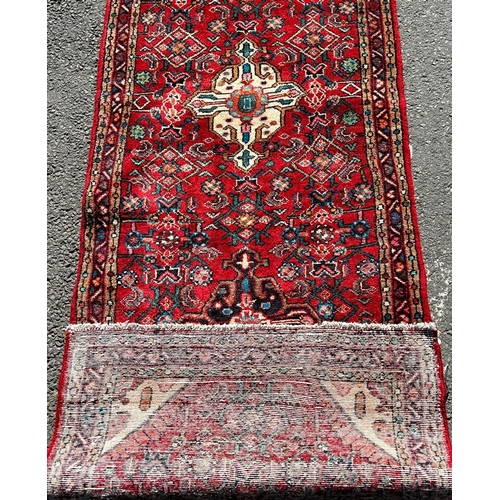 1623 - North West Persian Saveh Runner, with stylised floral medallion to the middle and repeating floral p... 