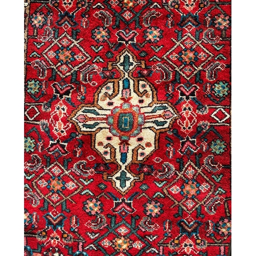 1623 - North West Persian Saveh Runner, with stylised floral medallion to the middle and repeating floral p... 