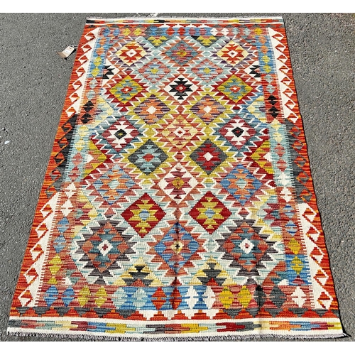 1624 - A Chobi Kilim with an all over repeating geometric pattern, 185cm x 125cm approx.