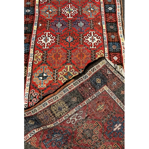 1630 - An old Persian designed runner with repeating geometric pattern to a central panel, 300cm x 95cm app... 