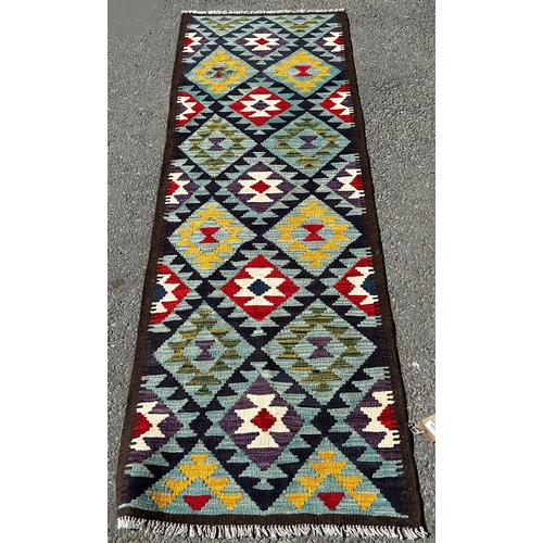 1638 - A Maimana Kilim Runner with a large stepped and diamond pattern on a blue ground 212cm x 70cm approx... 