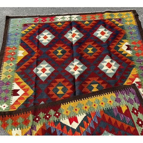 1641 - A Maimana Kilim with a repeating colourful over all geometric pattern, 258cm 153cm approx.