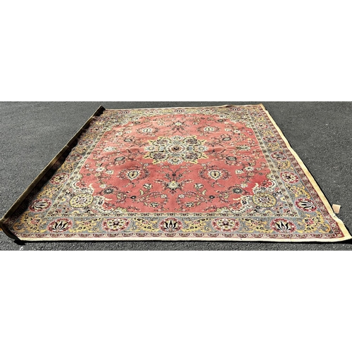 1642 - A large Middle Eastern machine made seamless Wilton all wool W G & Co Kidderminster carpet with a fl... 