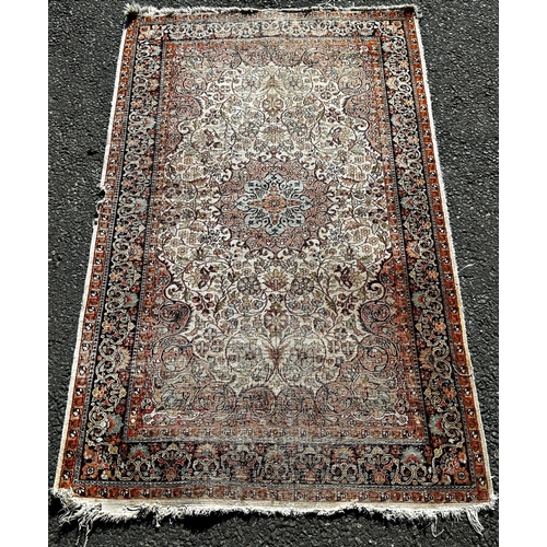 1650 - A small silk mat with a floral pattern (as found small holes) 118cm x 74cm, and another silk Persian... 