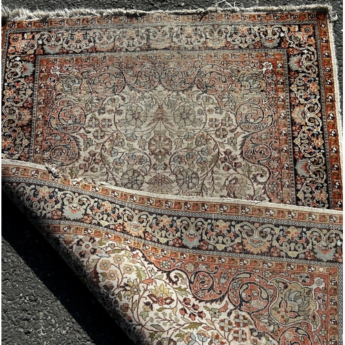 1650 - A small silk mat with a floral pattern (as found small holes) 118cm x 74cm, and another silk Persian... 