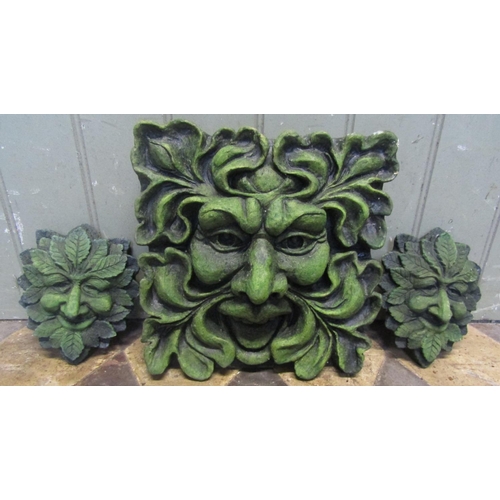 2079 - Three small cast composition stone ornamental green man wall plaques, the largest example 28cm squar... 