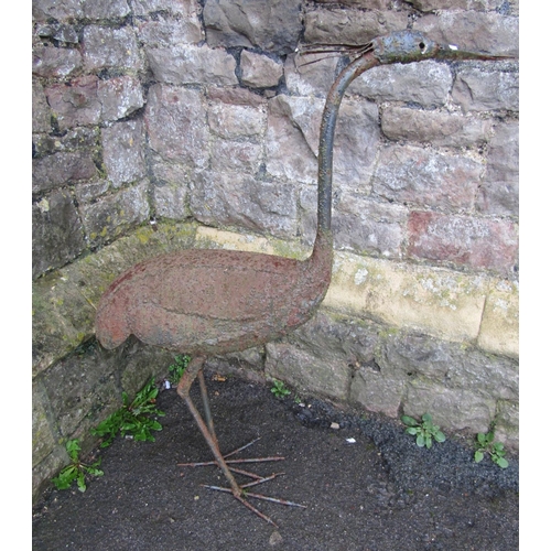 2081 - A weathered light steel garden ornament in the form of a standing crane, 93cm high