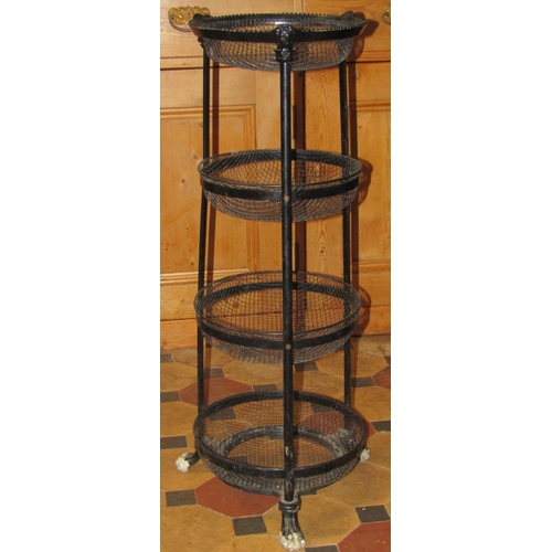 2090 - A painted cast alloy floorstanding vegetable stand, with four removable circular wire basket graduat... 