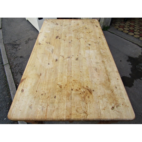 2351 - A Victorian style stripped pine farmhouse kitchen table with end frieze drawer raised on turned tape... 