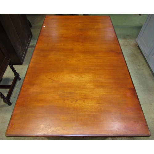 2354 - A retro G plan teak rectangular dining table with two additional end leaves raised on simple turned ... 