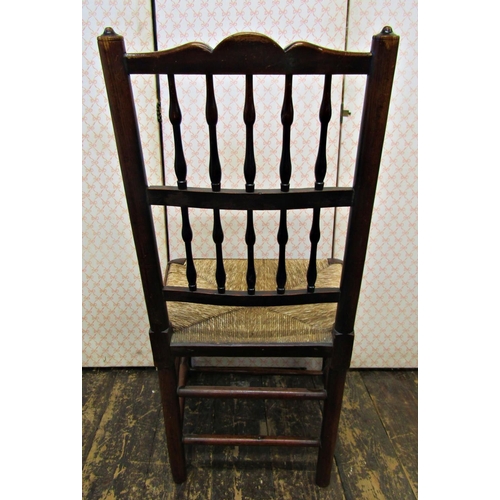 2568 - A pair of Georgian ashwood spindle back cottage chairs with rush seats and pad feet