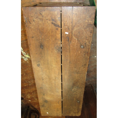 2569 - 18th century panelled oak coffer with simple plank lid, 140cm