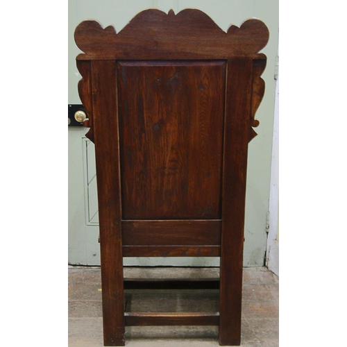 2570 - An old English oak Wainscot chair of usual form with carved and panelled framework