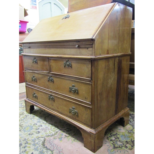 2571 - Antique Dutch walnut bureau of two long and two short drawers, with additional slide, the fall flap ... 