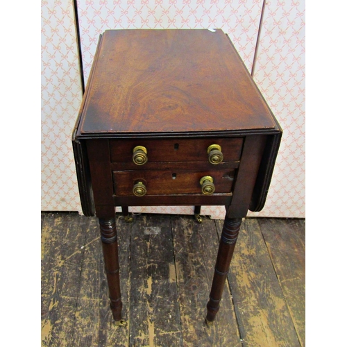 2582 - A Regency mahogany ladies sewing table, with two real and two dummy drawers on turned supports, 50cm... 