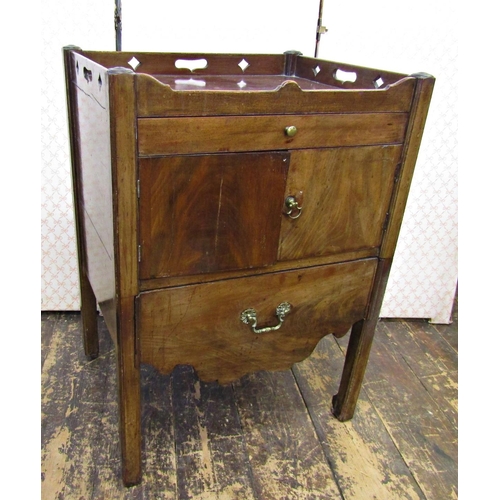 2583 - A Georgian mahogany tray top commode, the front elevation enclosed by a very shallow drawer, set wit... 