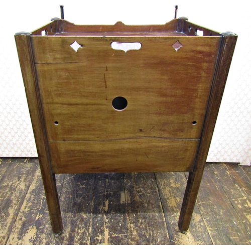 2583 - A Georgian mahogany tray top commode, the front elevation enclosed by a very shallow drawer, set wit... 