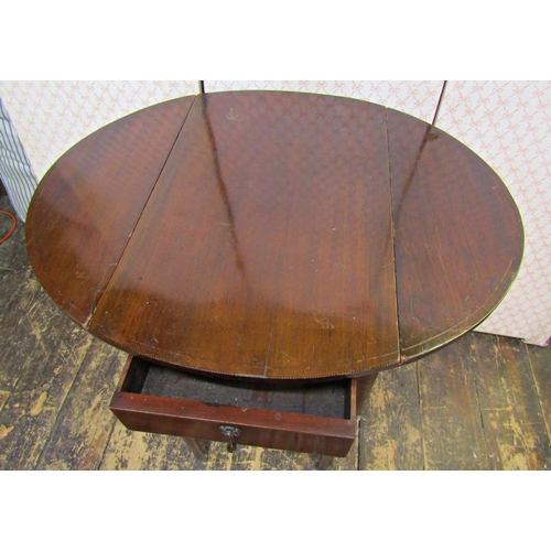 2584 - A small late 19th century mahogany Pembroke table, with frieze drawer, boxwood and ebony string band... 