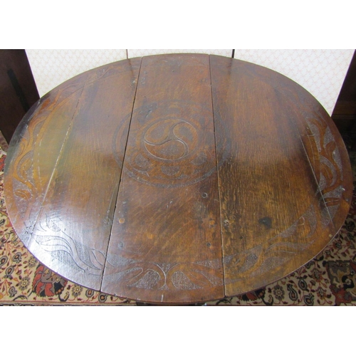 2592 - A Georgian oak gateleg table of narrow proportions, with shallow carved banded borders, 110cm long x... 