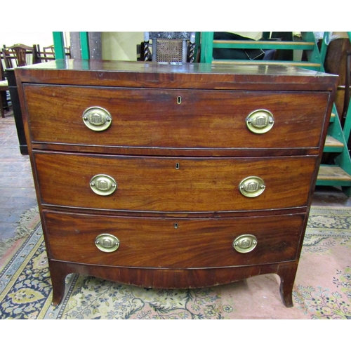 2597 - A Regency mahogany bowfronted chest of three long drawers with caddy top, raised on swept supports w... 