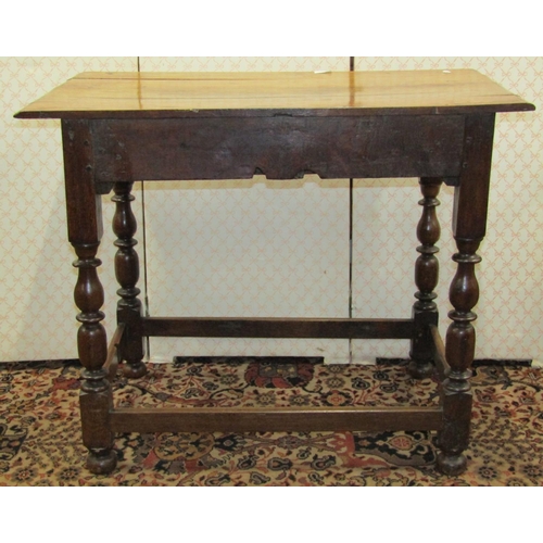 2598 - A Georgian oak country made side table with frieze drawer, on four turned supports, 90cm wide