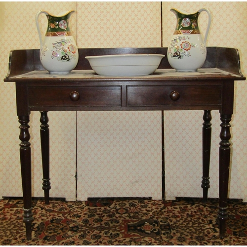 2600 - 19th century mahogany washstand with three quarter gallery and two dummy drawers, raised on turned s... 