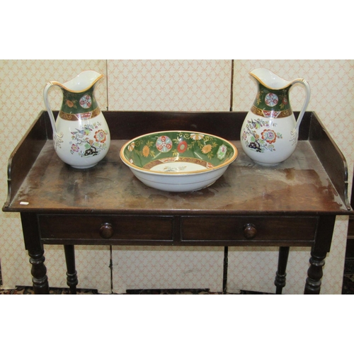 2600 - 19th century mahogany washstand with three quarter gallery and two dummy drawers, raised on turned s... 