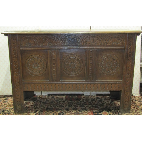 2602 - 18th century oak coffer, the front elevation with repeating flowerhead detail, 108cm wide