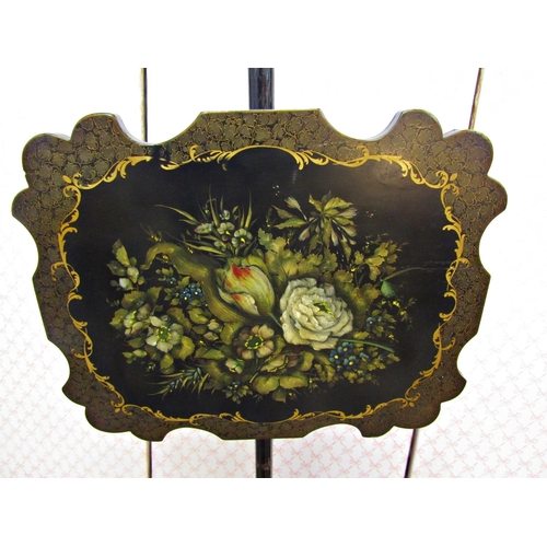 2608 - A Victorian lacquered pole screen with painted gilded and floral bouquet detail