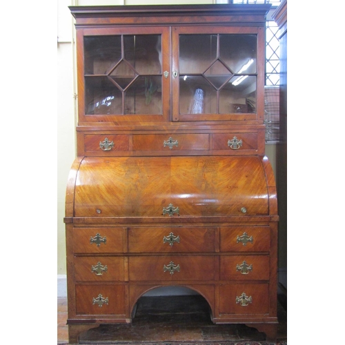 2615 - 19th century continental mahogany secretaire bookcase, the lower section enclosed by two long and tw... 