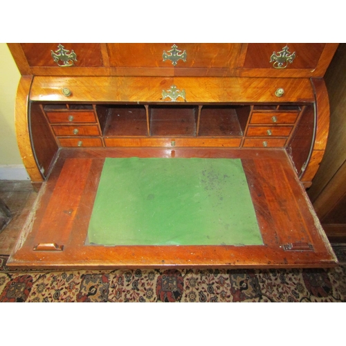 2615 - 19th century continental mahogany secretaire bookcase, the lower section enclosed by two long and tw... 