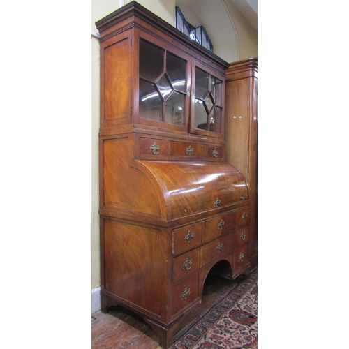 2615 - 19th century continental mahogany secretaire bookcase, the lower section enclosed by two long and tw... 