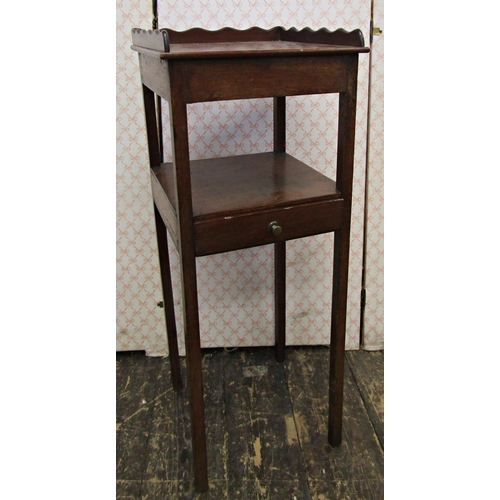 2617 - A small Georgian mahogany square cut wash stand with three quarter gallery and central drawer on squ... 