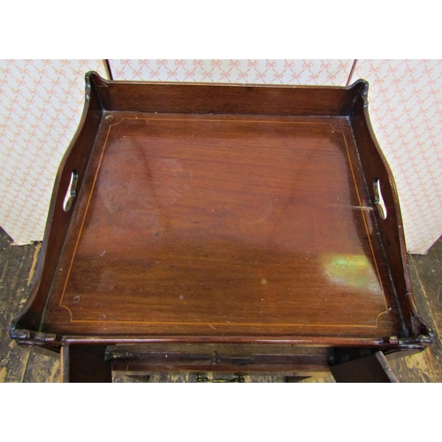 2618 - A Georgian mahogany tray top commode, the front elevation enclosed by a pair of panelled doors and f... 