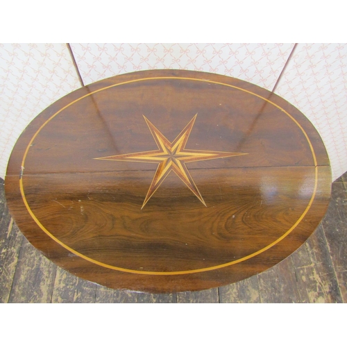 2639 - A Georgian mahogany occasional table, the oval top with starburst detail, raised on a tapering spira... 