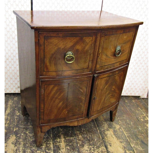 2652 - A Georgian mahogany bowfront side cupboard enclosed by a pair of panelled doors and two drawers, wit... 