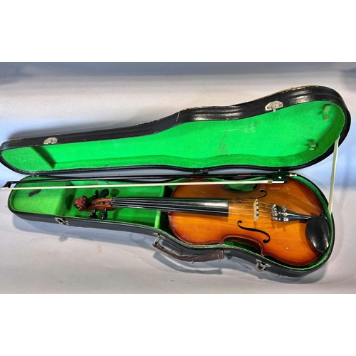 1522 - A Parrot Violin, made in China, and bow with a hard carry case, 55cm max and 35cm back.