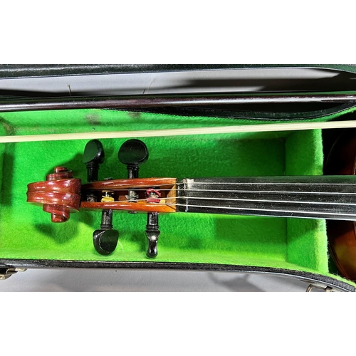 1522 - A Parrot Violin, made in China, and bow with a hard carry case, 55cm max and 35cm back.