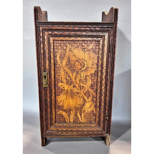 1526 - A small cabinet with poke work flowers on a basket weave affect background and a pair of drawers fro... 