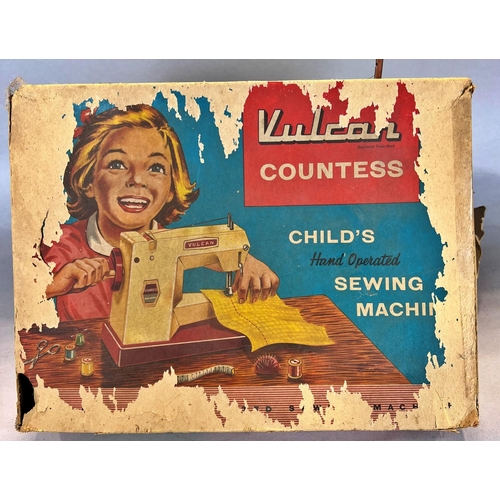 1531 - A child’s Vulcan Countess toy sewing machine, in its original box (box af).