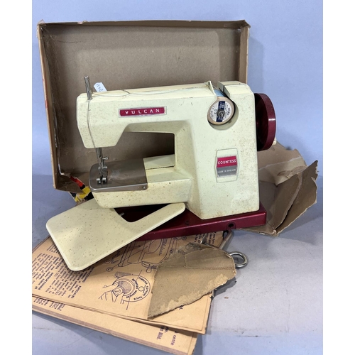 1531 - A child’s Vulcan Countess toy sewing machine, in its original box (box af).