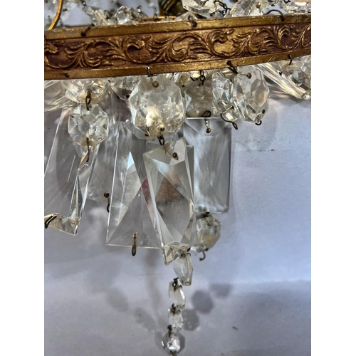 1533 - An Italian bag chandelier, with drops of crystal strands on a gold frame.